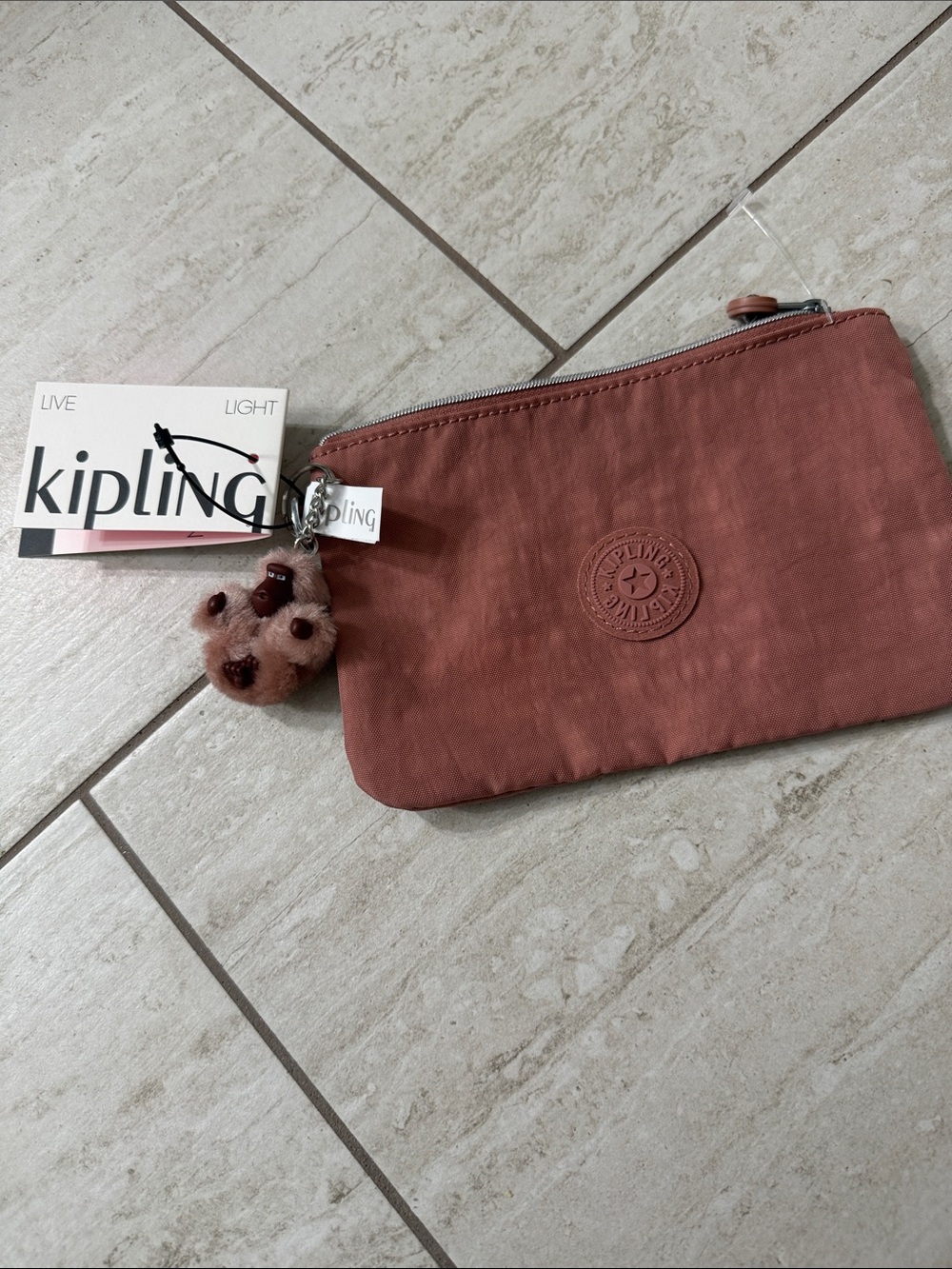 Kipling Dusty Rose Wristlet Pouch with Monkey Charm..authentic ..new with tags